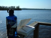 Shade + linux book + water + lake = happiness
